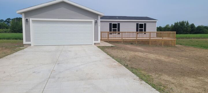 Property Photo: 5556 W Lake Boulevard MI 49420