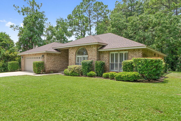 Property Photo:  2431 Knotty Pine Drive  FL 32566 