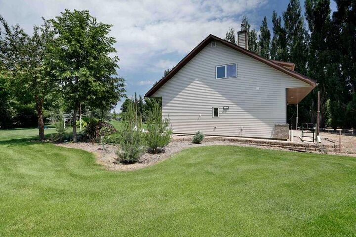 Property Photo: 145006 Cassils Road 142 AB T1R 1B4