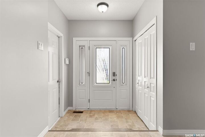 Property Photo:  6903 Sherwood Drive  SK S4X 1C2 
