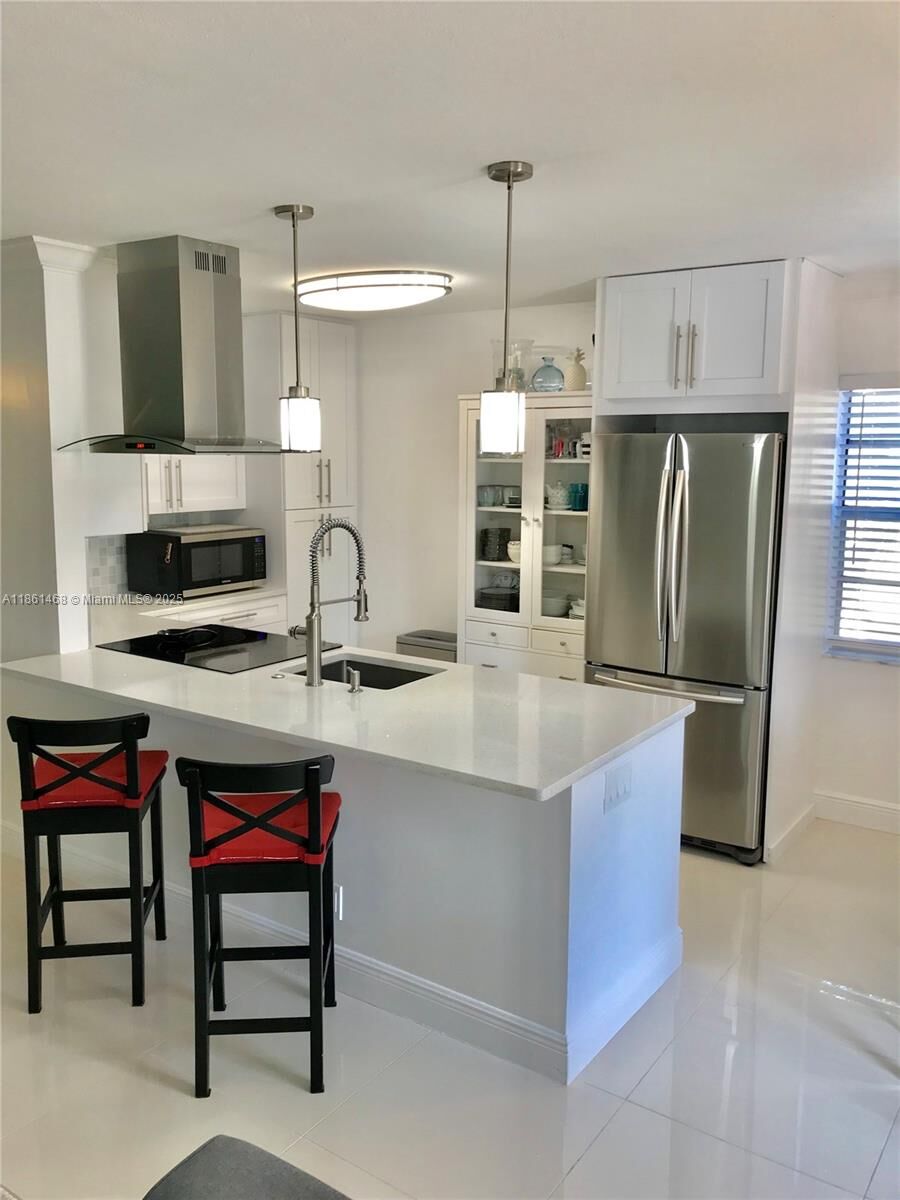 Property Photo:  466 Normandy J 466  FL 33484 