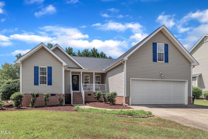 Property Photo: 208 Grassy Meadow Road NC 27540