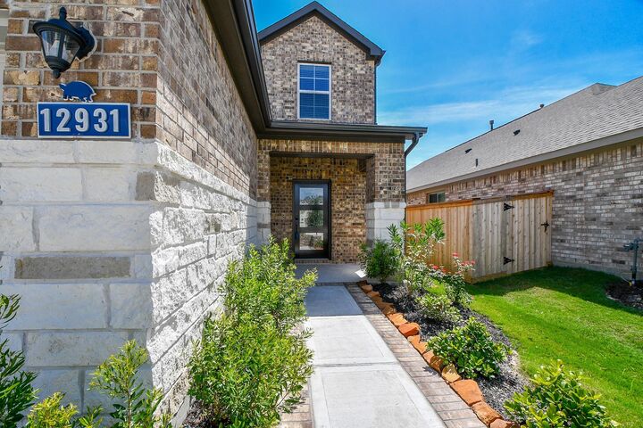 Property Photo: 12931 California Palm Court TX 77433