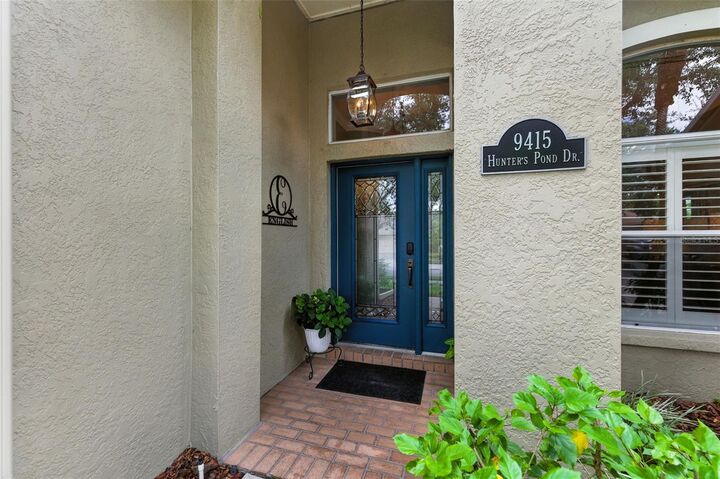 Property Photo:  9415 Hunters Pond Drive  FL 33647 