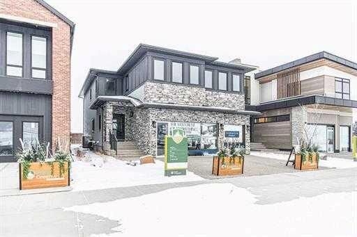 Property Photo:  356 Greenwich Drive NW  AB T3B 6P4 