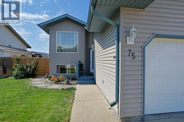 Property Photo: 75 Upland Road West AB T1R 1G7