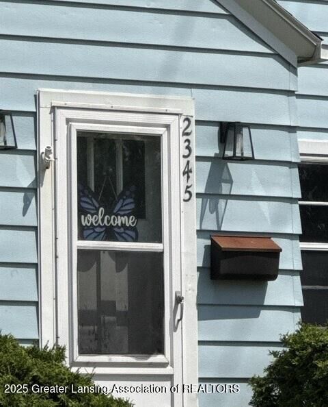Property Photo:  2345 Lyons Avenue  MI 48910 