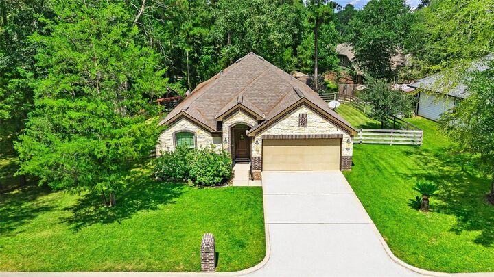 Property Photo: 9023 S Comanche Circle TX 77378