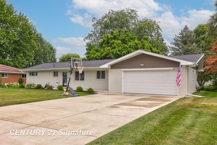 Property Photo:  6235 Dewhirst Drive  MI 48638 