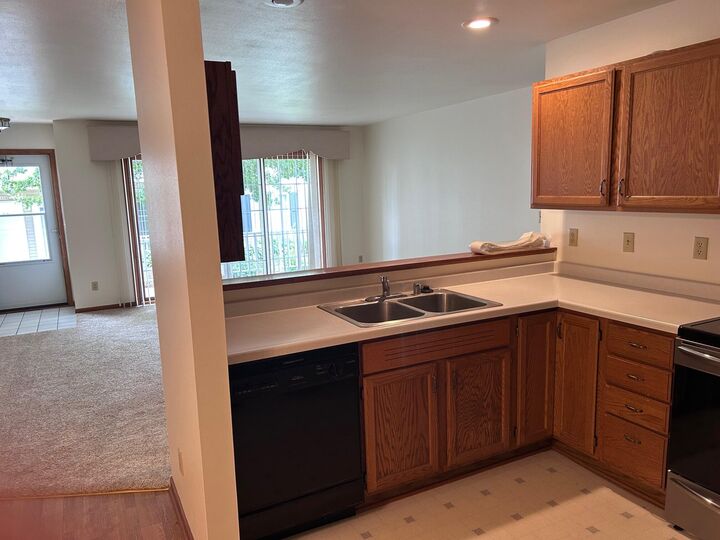 Property Photo:  203 Bur Oak Ln A  WI 53024 