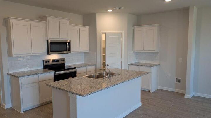 Property Photo: 933 Traction Trail TX 76031