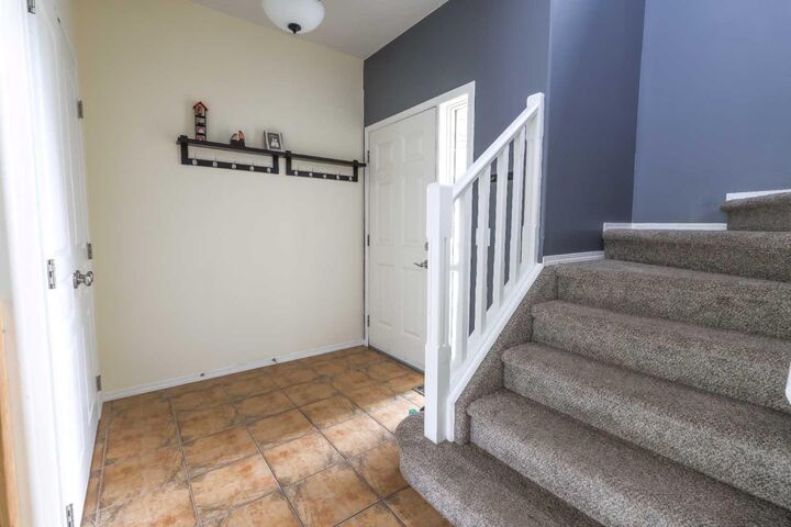 Property Photo:  6810 59 Street Close  AB T4T 1V9 