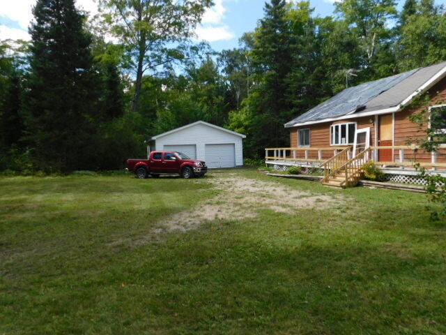 Property Photo:  29098 W H-40  MI 49760 