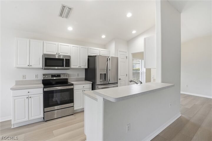 Property Photo:  10055 Oakhurst Way  FL 33913 