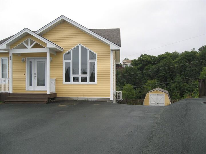 Property Photo: 15 Maple Ridge Place NE A1W 0E1