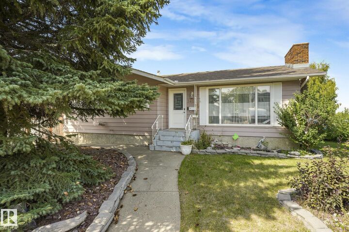 Property Photo: 1408 76 Street NW AB T6K 2R9