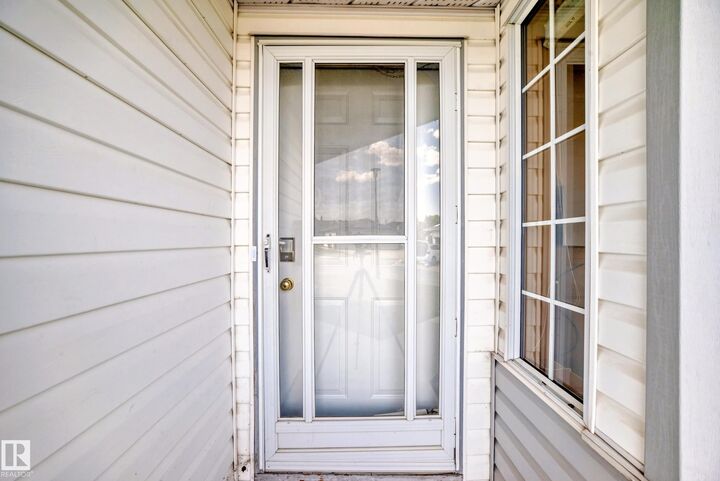 Property Photo: 15571 59A Street NW AB T5Y 2N9