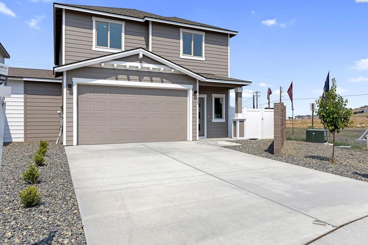 Property Photo:  7402 Grapevine Ct  WA 99353 