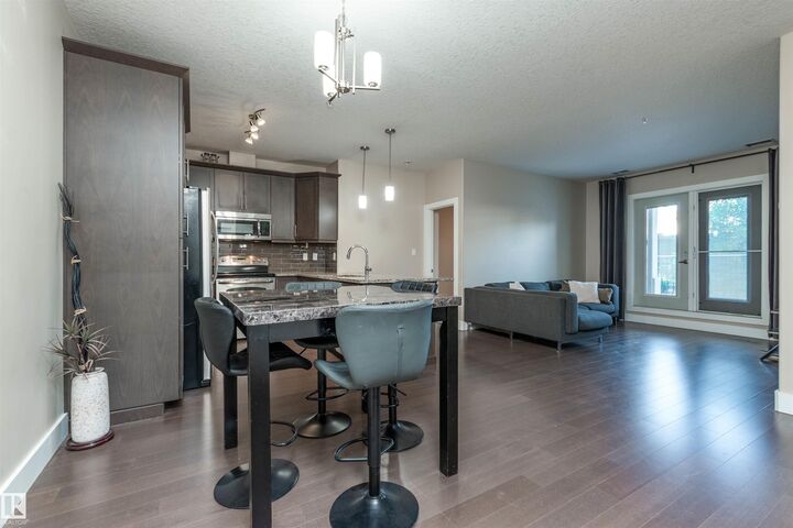 Property Photo: 6079 Maynard Way NW 140 AB T6R 0S4
