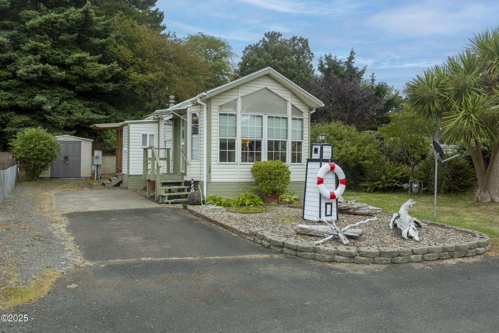 Property Photo:  1210 SE 48th Place 10  OR 97367 