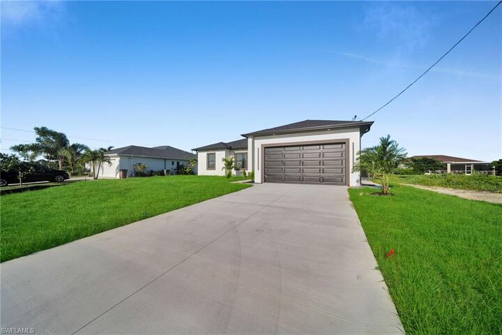 3102 Douglas Ave S  Lehigh Acres FL 33976 photo