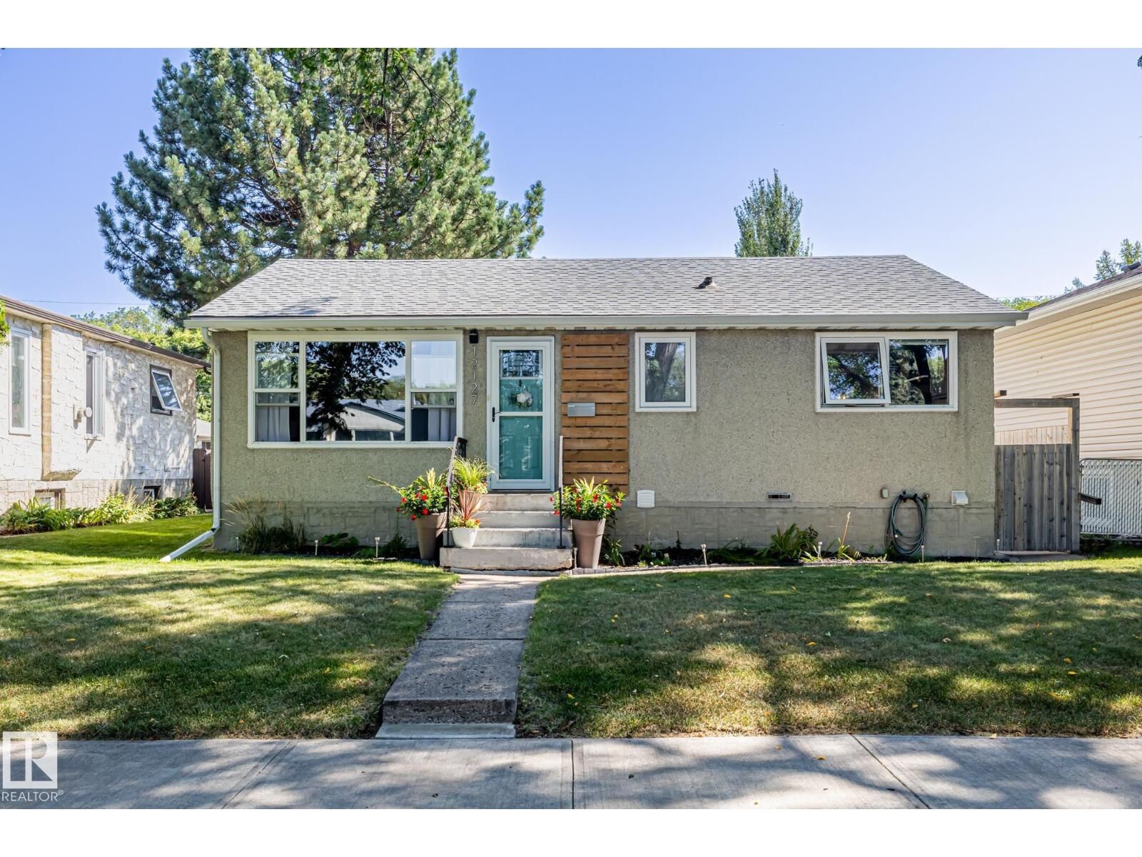 Property Photo:  12127 61 St NW  AB T5W 4B4 