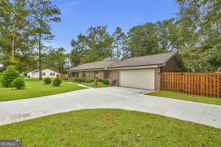 Property Photo:  208 S Topi Trail  GA 31313 