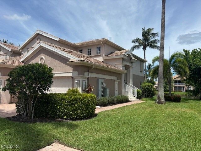 Property Photo: 13960 Lake Mahogany Boulevard 1922 FL 33907