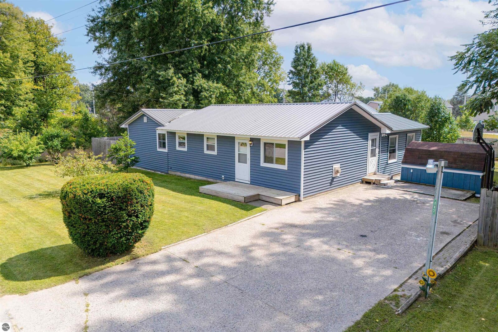 Property Photo:  117 W Carl Street  MI 49620 