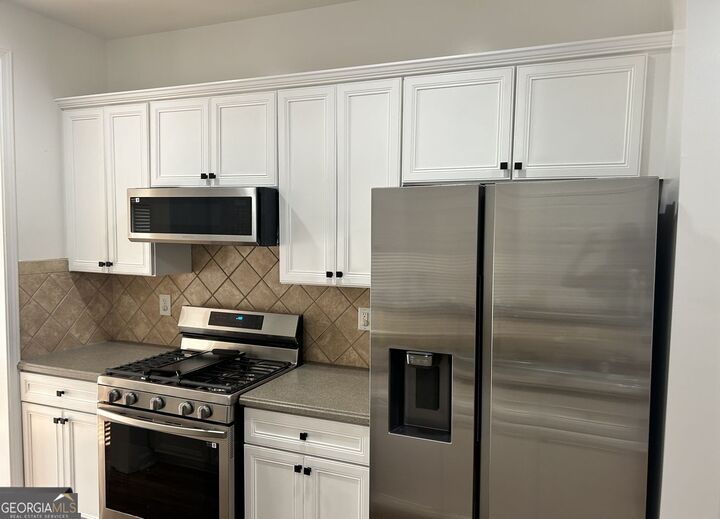 Property Photo:  14084 Voyage Trail  GA 30004 