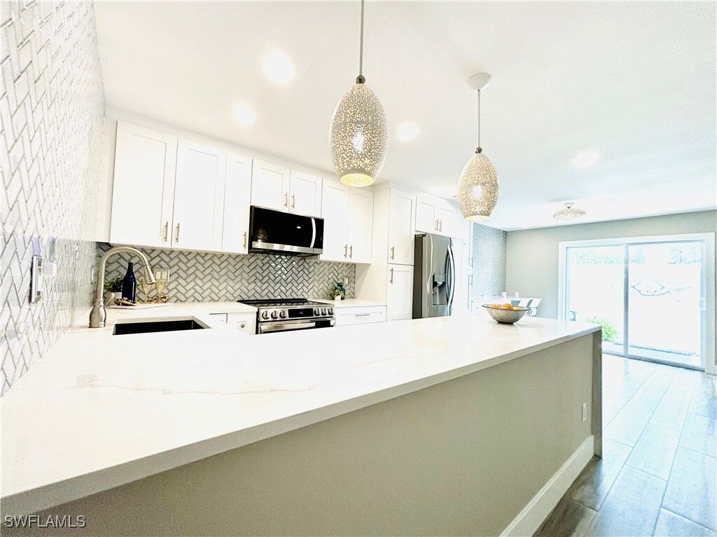 Property Photo:  1455 Curlew Avenue 1  FL 34102 