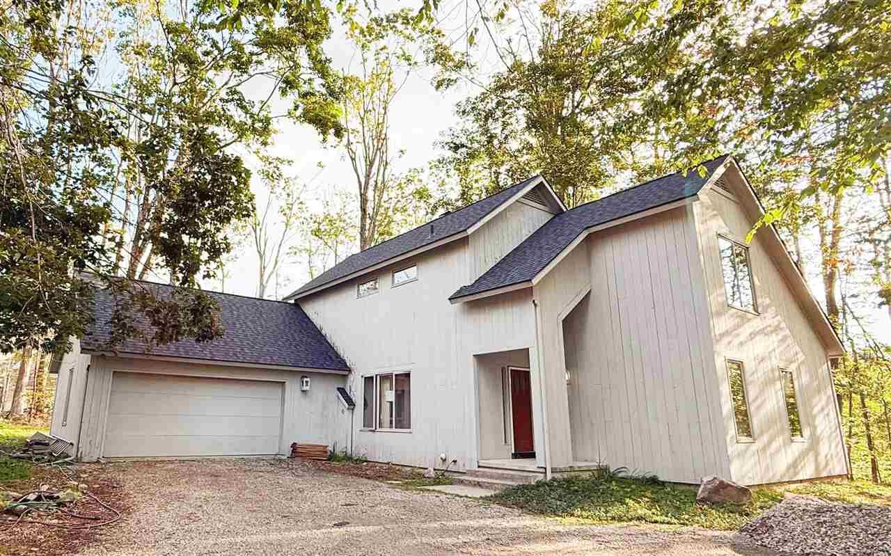 Property Photo:  4790 Mariners Point  MI 49740 