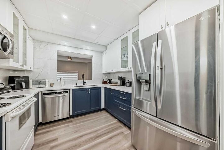 Property Photo:  7 Westland Road 2  AB T1S 1Z1 