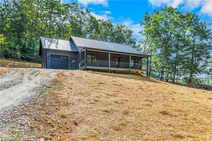 Property Photo:  64 Lonesome Oak Drive  NC 28623 
