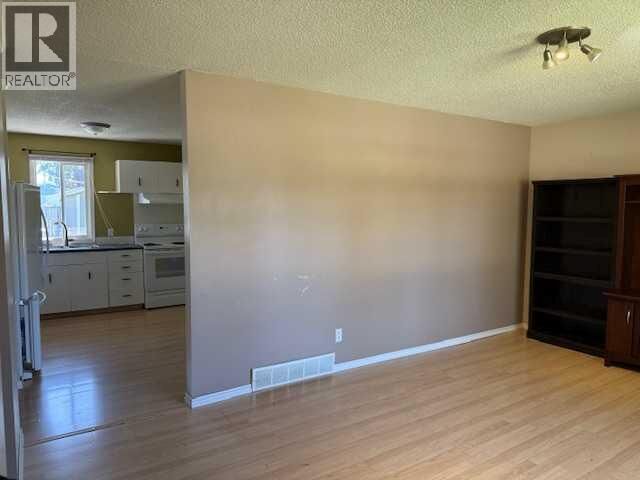 Property Photo:  10203 103 Street  AB T0H 1Z0 