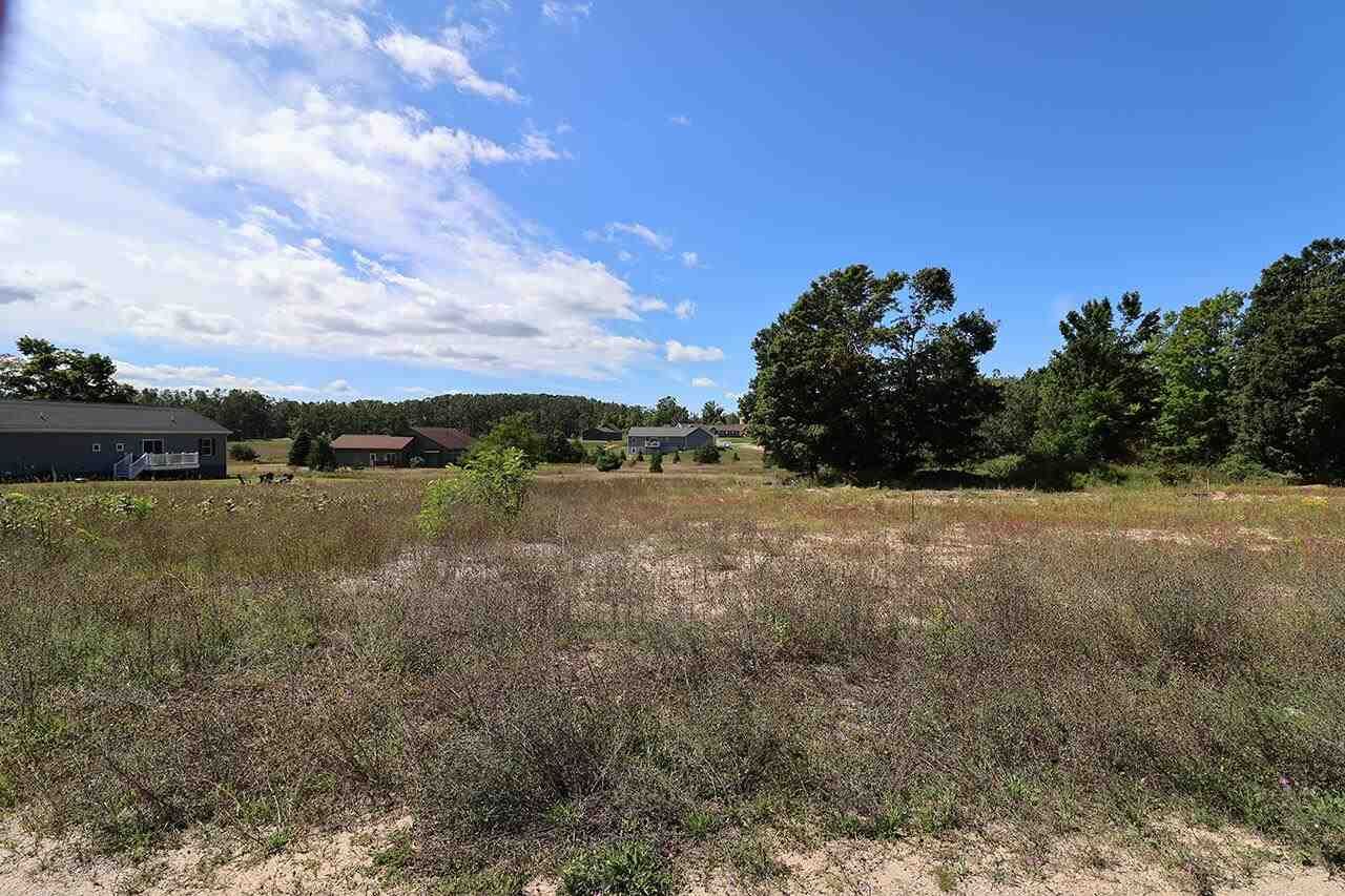 Property Photo:  943 Windsong #28  MI 49770 