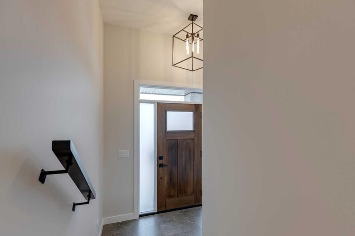 Property Photo:  167 Greenwich Drive NW  AB T3B 6N9