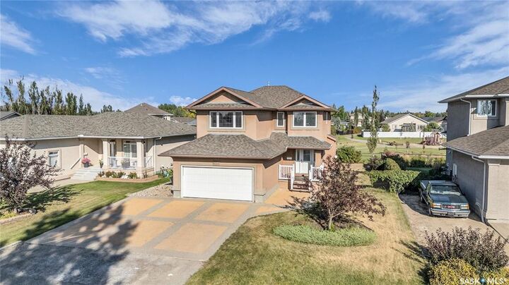 Property Photo: 64 Woods Crescent SK S4L 1C5