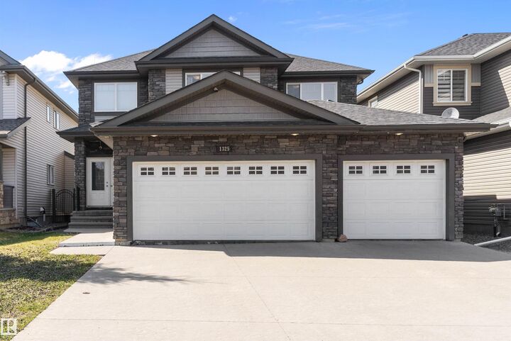 Property Photo: 1325 Adamson Drive SW AB T6W 2N8