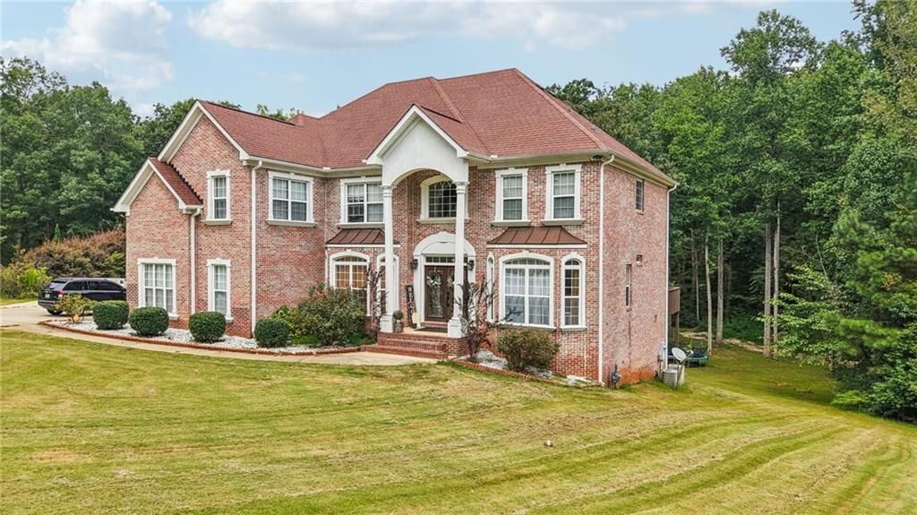 Property Photo: 216 Johns Creek Lane GA 30281