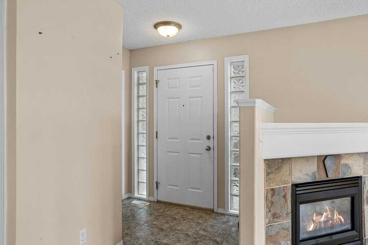 Property Photo:  819 Wilson Way 3  AB T1W 2Y8 