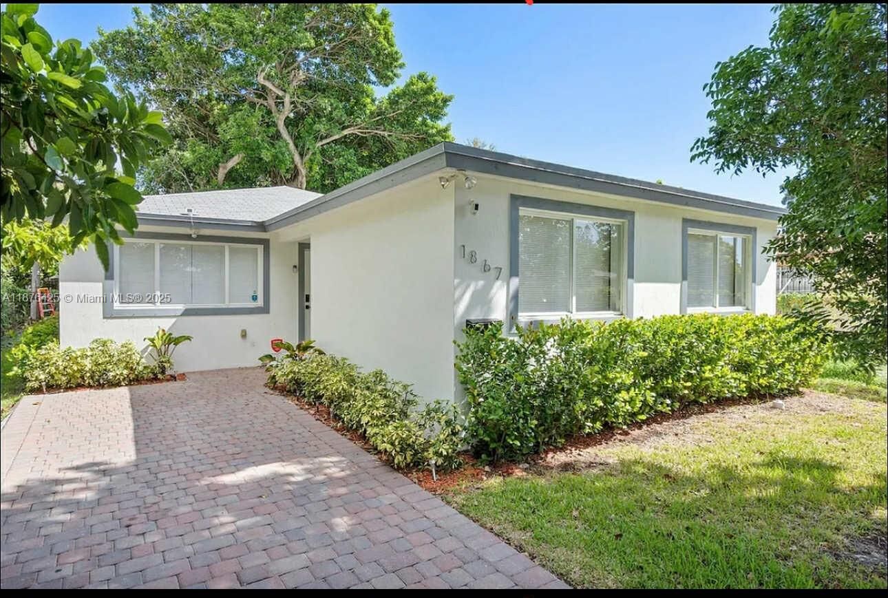 Property Photo: 1867 NW 46th St FL 33142