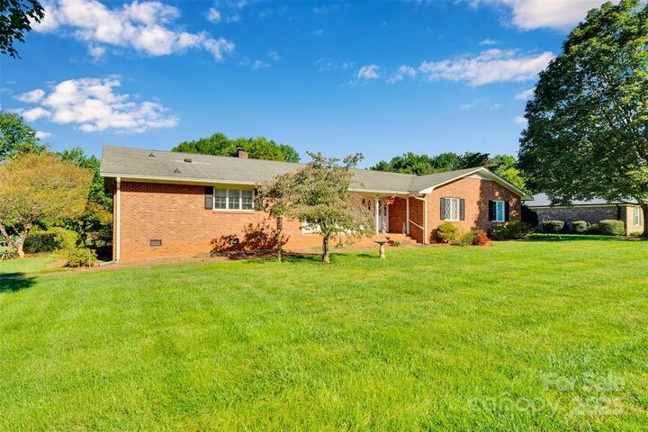 Property Photo:  10701 Washam Potts Road  NC 28031 