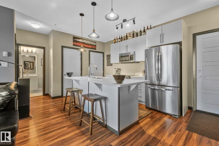 Property Photo: 1144 Adamson Drive SW 404 AB T6W 2X7