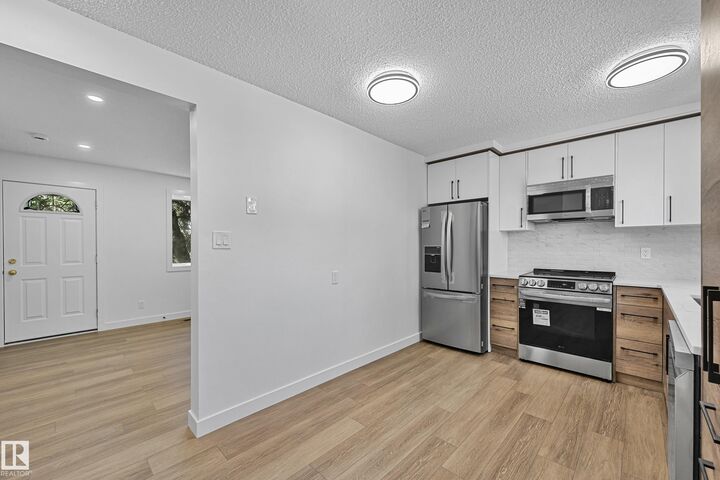 Property Photo:  416 Hermitage Road NW  AB T5A 3K9 