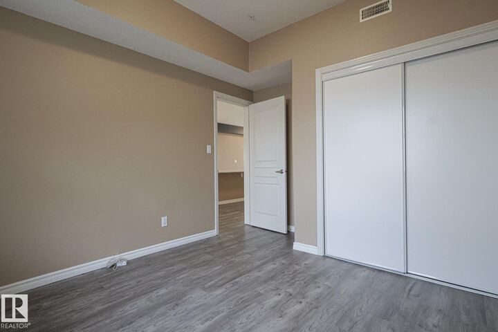 Property Photo:  9507 101 Avenue NW 113  AB T5H 4R1 