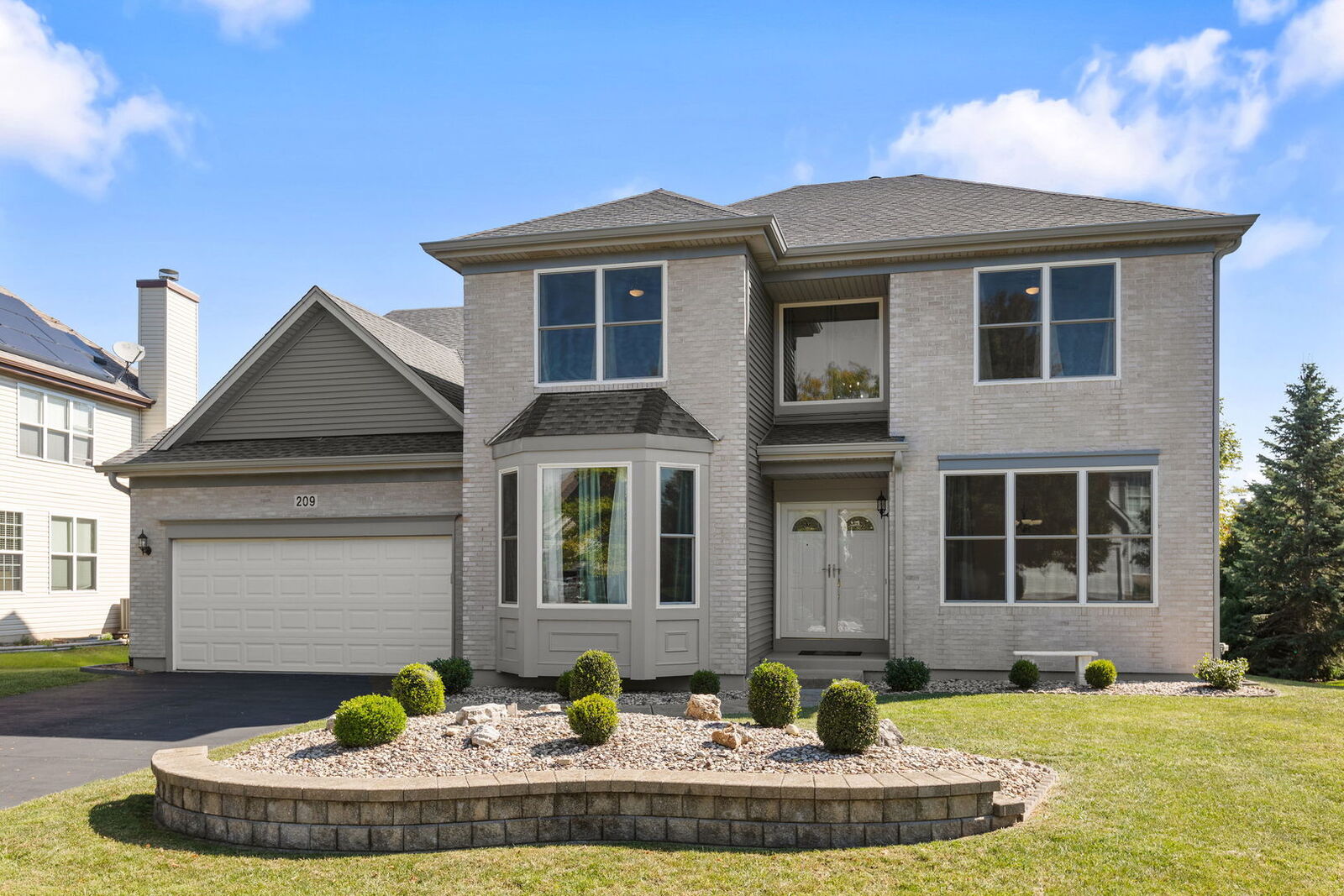 Property Photo:  209 Regency Boulevard  IL 60554 