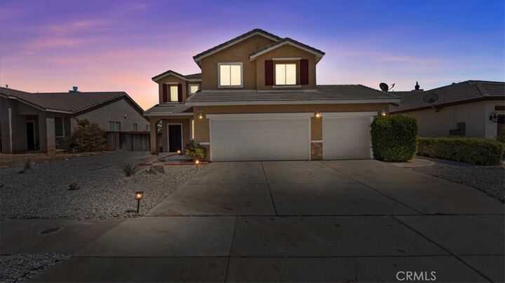 Property Photo:  8943 Hydrangea Avenue  CA 92344 