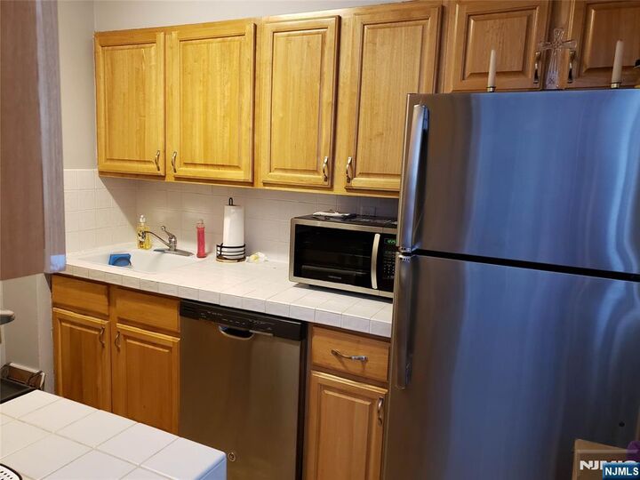 Property Photo: 6050 Kennedy Boulevard 12D NJ 07093