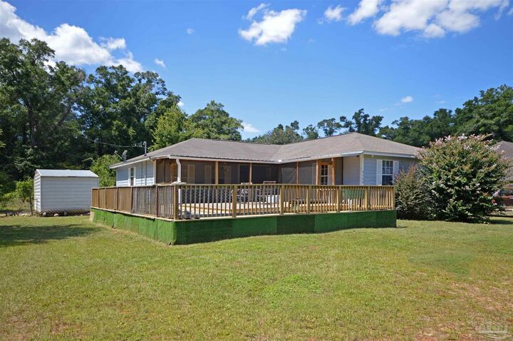 Property Photo: 4163 Woodville Rd FL 32583